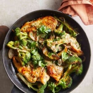 Chicken and broccoli in a skillet.